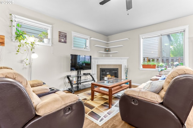 2741 25th Pl, Forest Grove, OR 97116 - living area featuring healthy amount of natural light, light wood-style floors, a fireplace, and ceiling fan