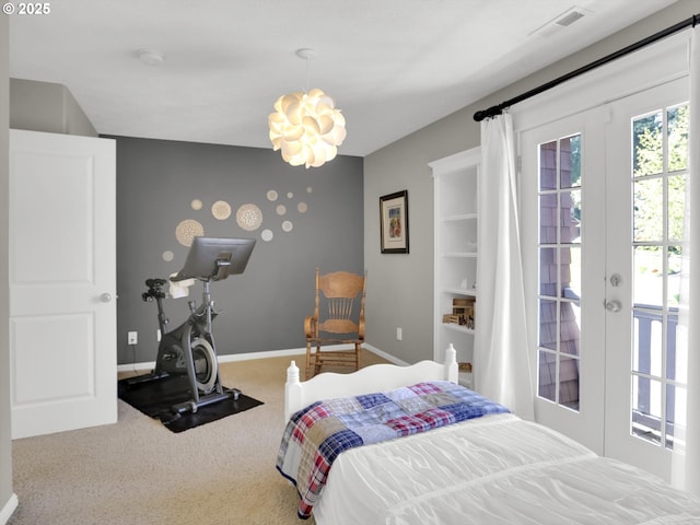 carpeted bedroom featuring visible vents, access to exterior, baseboards, a chandelier, and french doors