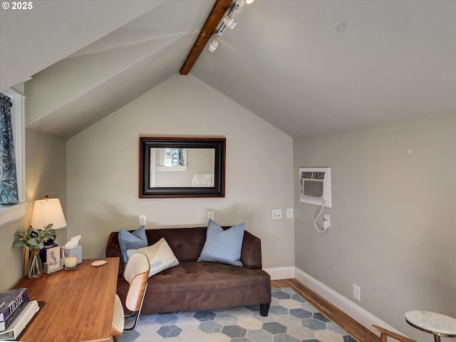 living area featuring wood finished floors, baseboards, vaulted ceiling with beams, a wall mounted AC, and rail lighting