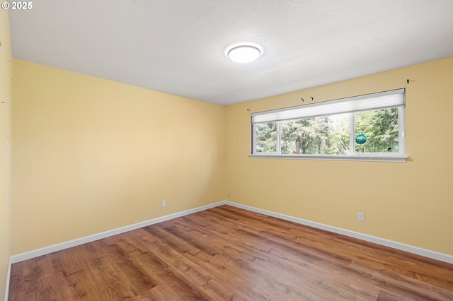 536 Kingswood Ave, Eugene, OR 97405 - empty room featuring baseboards and wood finished floors