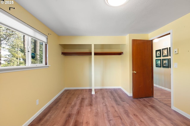 536 Kingswood Ave, Eugene, OR 97405 - unfurnished bedroom featuring baseboards, a closet, and wood finished floors