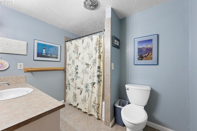 536 Kingswood Ave, Eugene, OR 97405 - full bath with baseboards, a textured ceiling, and toilet