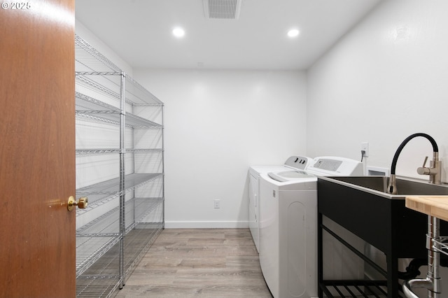 536 Kingswood Ave, Eugene, OR 97405 - laundry area with laundry area, visible vents, washer and dryer, light wood-style floors, and recessed lighting