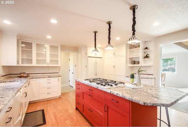 2440 SW Burbank Ave, Portland, OR 97225 - kitchen featuring white appliances, tasteful backsplash, recessed lighting, light wood-style flooring, and open shelves