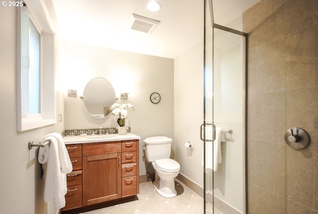 2440 SW Burbank Ave, Portland, OR 97225 - bathroom featuring a shower stall, vanity, and tile patterned floors