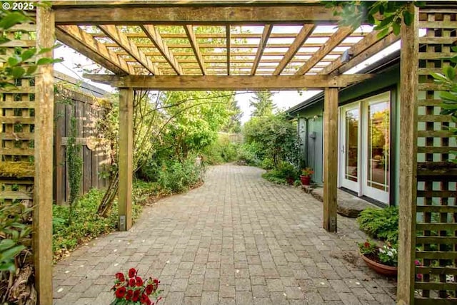 2440 SW Burbank Ave, Portland, OR 97225 - fenced backyard featuring a patio and a pergola
