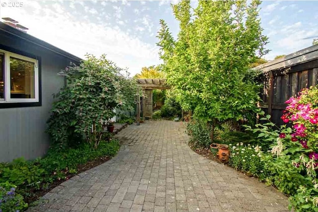 2440 SW Burbank Ave, Portland, OR 97225 - fenced backyard featuring a patio area