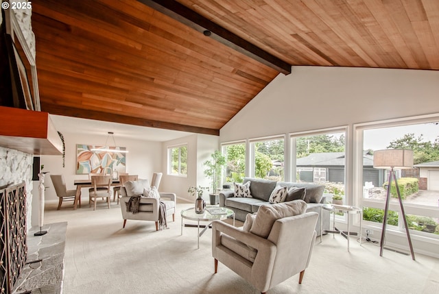2440 SW Burbank Ave, Portland, OR 97225 - living area with a wooden ceiling with exposed beams, light carpet, and high vaulted ceiling