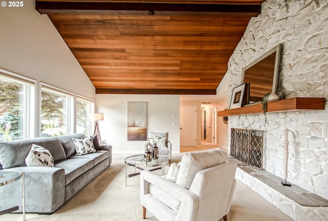 2440 SW Burbank Ave, Portland, OR 97225 - living area featuring wood ceiling, a stone fireplace, high vaulted ceiling, and carpet flooring