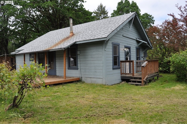 87624 Territorial Rd, Veneta, OR 97487 - view of front facade with a shingled roof, a front yard, and a deck