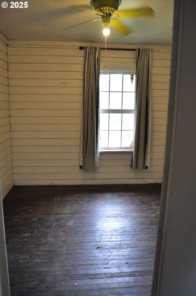87624 Territorial Rd, Veneta, OR 97487 - unfurnished room with ceiling fan, hardwood / wood-style flooring, and wood walls