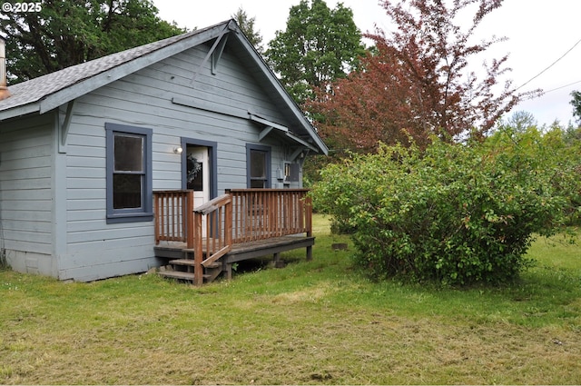 87624 Territorial Rd, Veneta, OR 97487 - rear view of house featuring a yard and a shingled roof