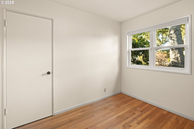 unfurnished bedroom featuring light hardwood / wood-style flooring