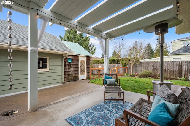 view of patio / terrace featuring fence