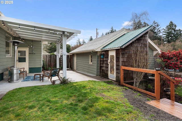 view of yard featuring a pergola, a patio, and fence