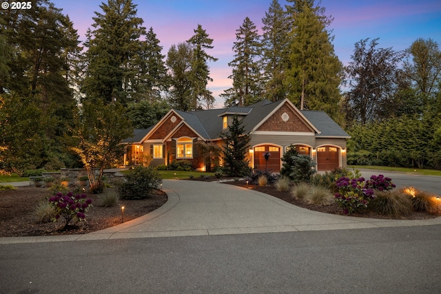 31678 SW Isle Way Ln, West Linn, OR 97068 - view of front of home featuring curved driveway and an attached garage
