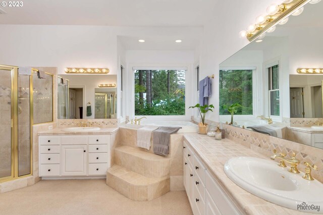 46769 Goodpasture Rd, Vida, OR 97488 - full bath with a sink, two vanities, a stall shower, and a garden tub