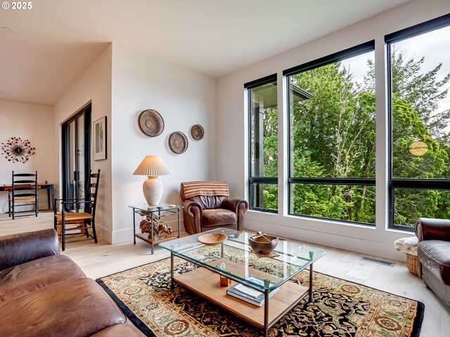 522 NE Province Dr, Camas, WA 98607 - living room featuring plenty of natural light and wood finished floors
