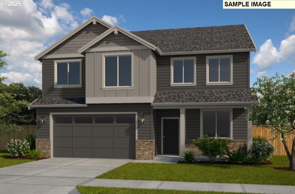 9105 S 3rd St Unit 117, Ridgefield, WA 98642 - craftsman-style home featuring stone siding, an attached garage, fence, and board and batten siding