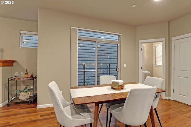 dining room with light wood-type flooring