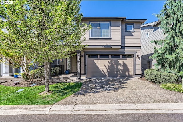 view of front of house featuring an attached garage and driveway