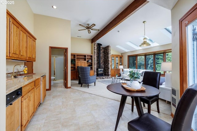 2350 SW Gregory Dr, West Linn, OR 97068 - dining space with a wood stove, ceiling fan, recessed lighting, and light tile patterned floors