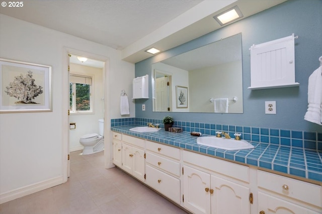 2350 SW Gregory Dr, West Linn, OR 97068 - full bathroom featuring double vanity and tile patterned floors