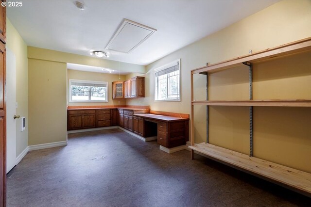 2350 SW Gregory Dr, West Linn, OR 97068 - basement with healthy amount of natural light, dark colored carpet, and built in desk