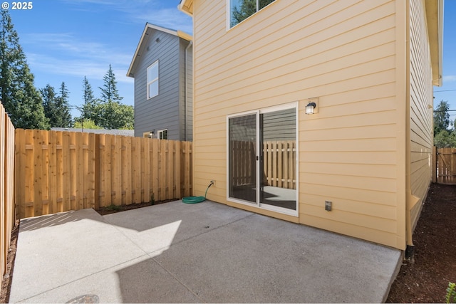 view of patio with a fenced backyard