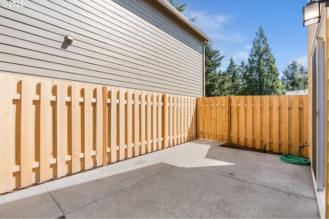 view of patio with fence