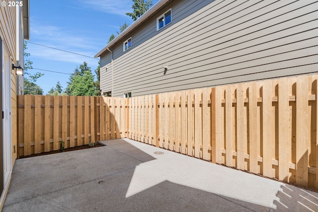 view of patio with fence