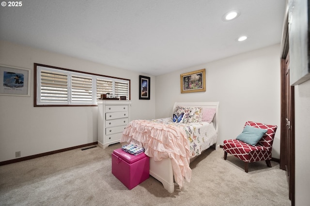 carpeted bedroom with visible vents, recessed lighting, and baseboards