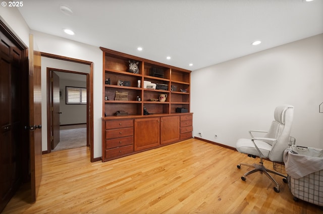 office with baseboards, recessed lighting, and light wood-style flooring