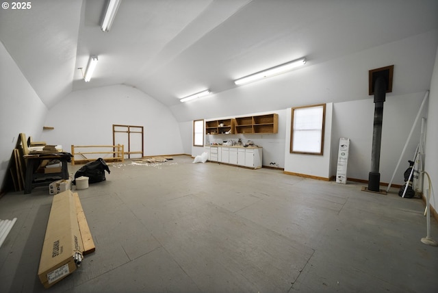 interior space with plenty of natural light and vaulted ceiling