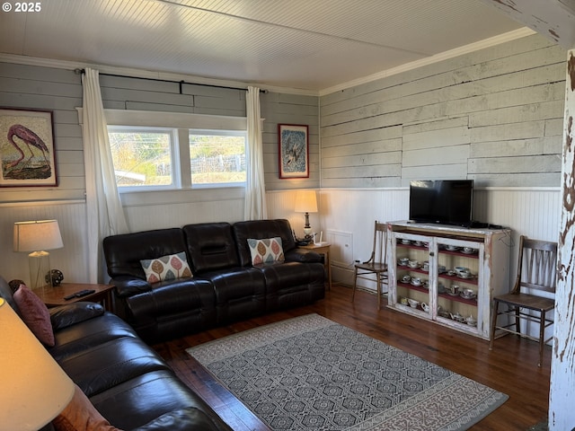 living room featuring wood-type flooring and crown molding