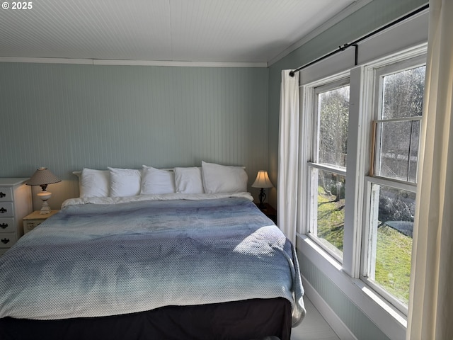 bedroom featuring ornamental molding