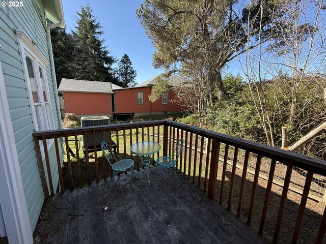 wooden terrace with cooling unit