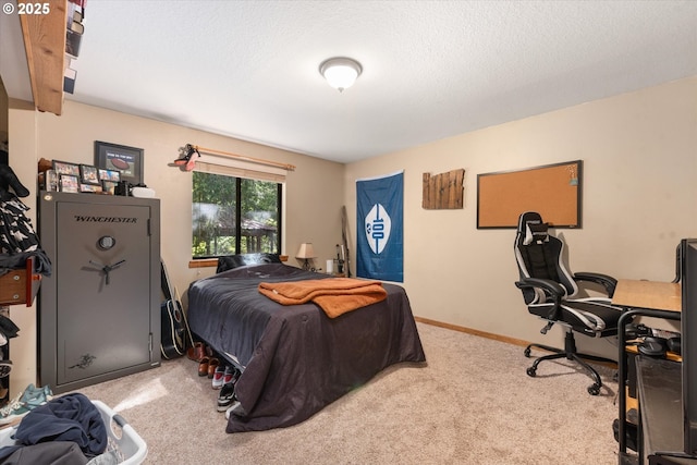 62436 Mink Ln, Summerville, OR 97876 - bedroom with carpet flooring, a textured ceiling, and baseboards