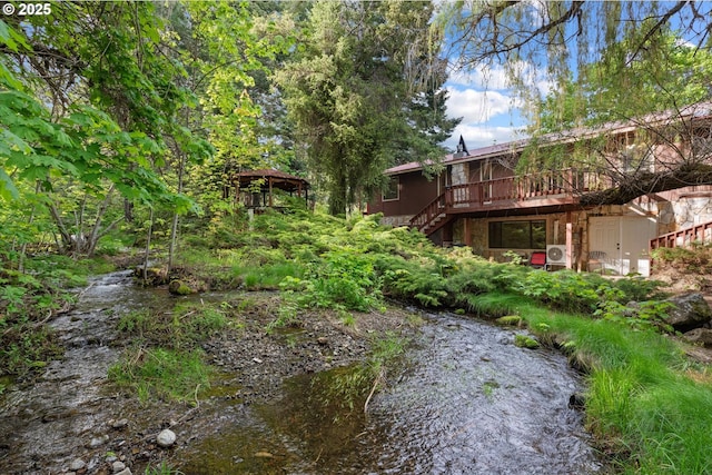62436 Mink Ln, Summerville, OR 97876 - view of yard with stairway, a deck, and a cooling unit