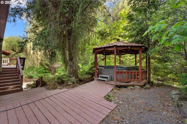 62436 Mink Ln, Summerville, OR 97876 - deck with a hot tub, stairway, and a gazebo