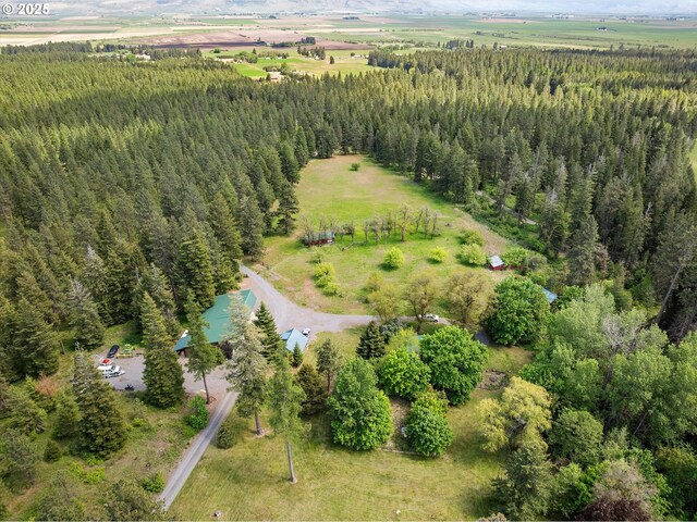 62436 Mink Ln, Summerville, OR 97876 - aerial view of property and surrounding area featuring a heavily wooded area