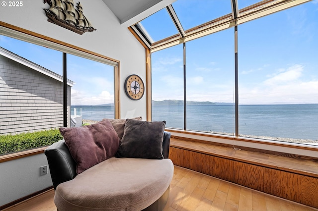 765 5th Ave Unit 5, Hammond, OR 97121 - sunroom with a water view, plenty of natural light, and vaulted ceiling