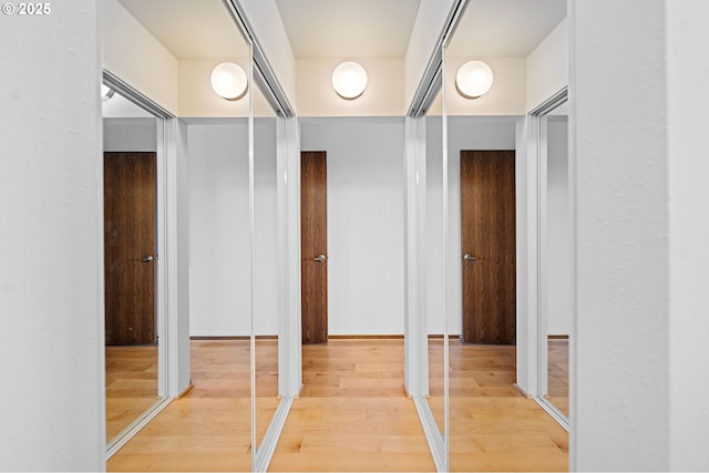765 5th Ave Unit 5, Hammond, OR 97121 - hallway with wood finished floors