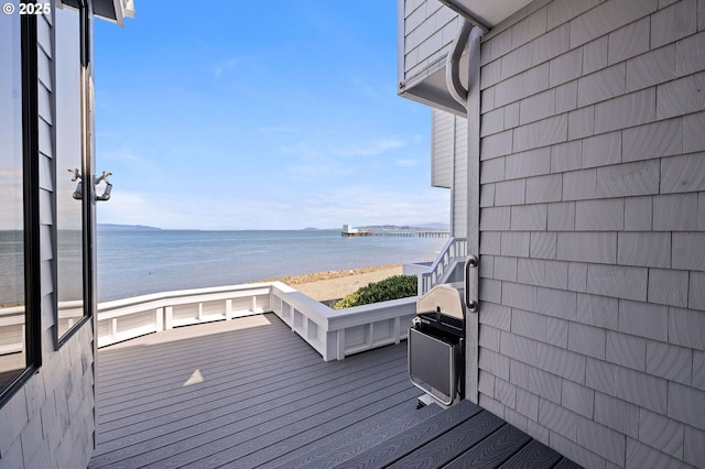 765 5th Ave Unit 5, Hammond, OR 97121 - wooden terrace with view of water and beach and area for grilling