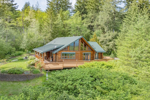 35919 NE 25th Cir, Washougal, WA 98671 - back of property with log exterior, a wooded view, and a wooden deck