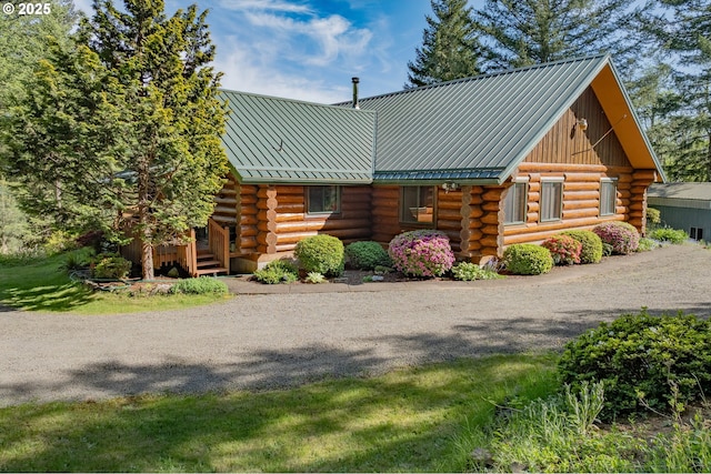35919 NE 25th Cir, Washougal, WA 98671 - log home with log siding, metal roof, and a standing seam roof