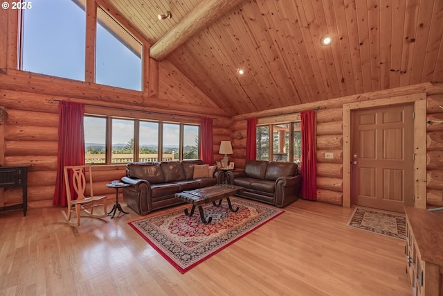 35919 NE 25th Cir, Washougal, WA 98671 - living area with high vaulted ceiling, wood ceiling with exposed beams, light wood-type flooring, log walls, and recessed lighting