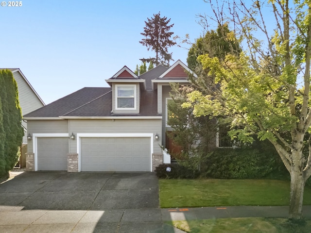 22767 SW Saunders Dr, Sherwood, OR 97140 - traditional-style home featuring a front lawn, concrete driveway, an attached garage, brick siding, and a shingled roof