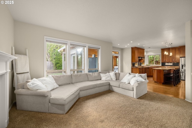 22767 SW Saunders Dr, Sherwood, OR 97140 - living area featuring light colored carpet and recessed lighting