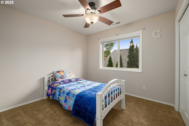 22767 SW Saunders Dr, Sherwood, OR 97140 - bedroom featuring carpet, a closet, baseboards, and ceiling fan